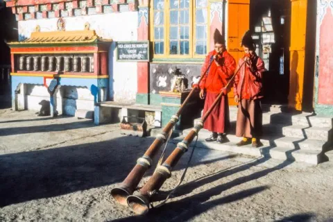 Monks of the old Ghoom monastery playing music